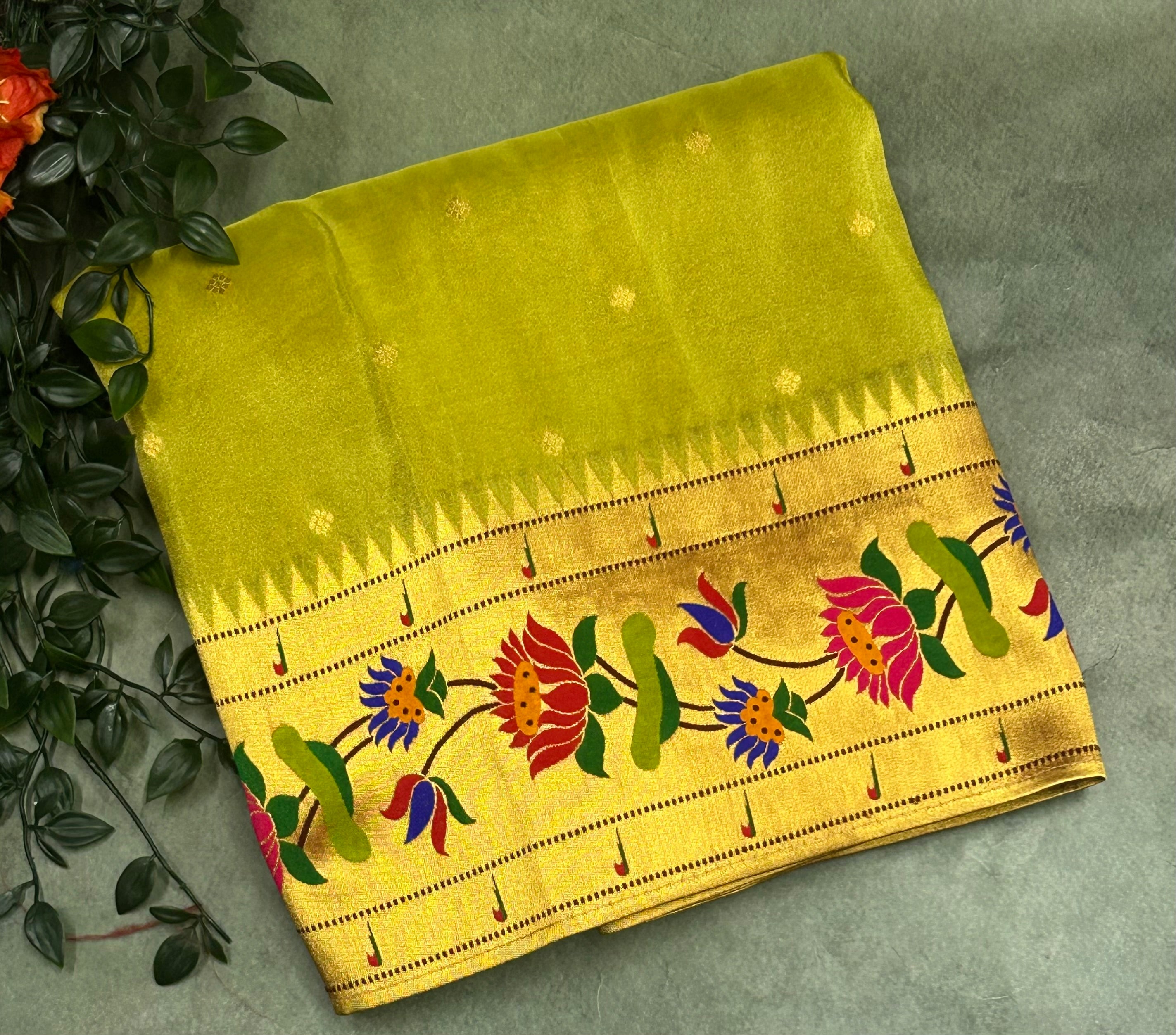 Pastel green small butta tissue paithani border saree