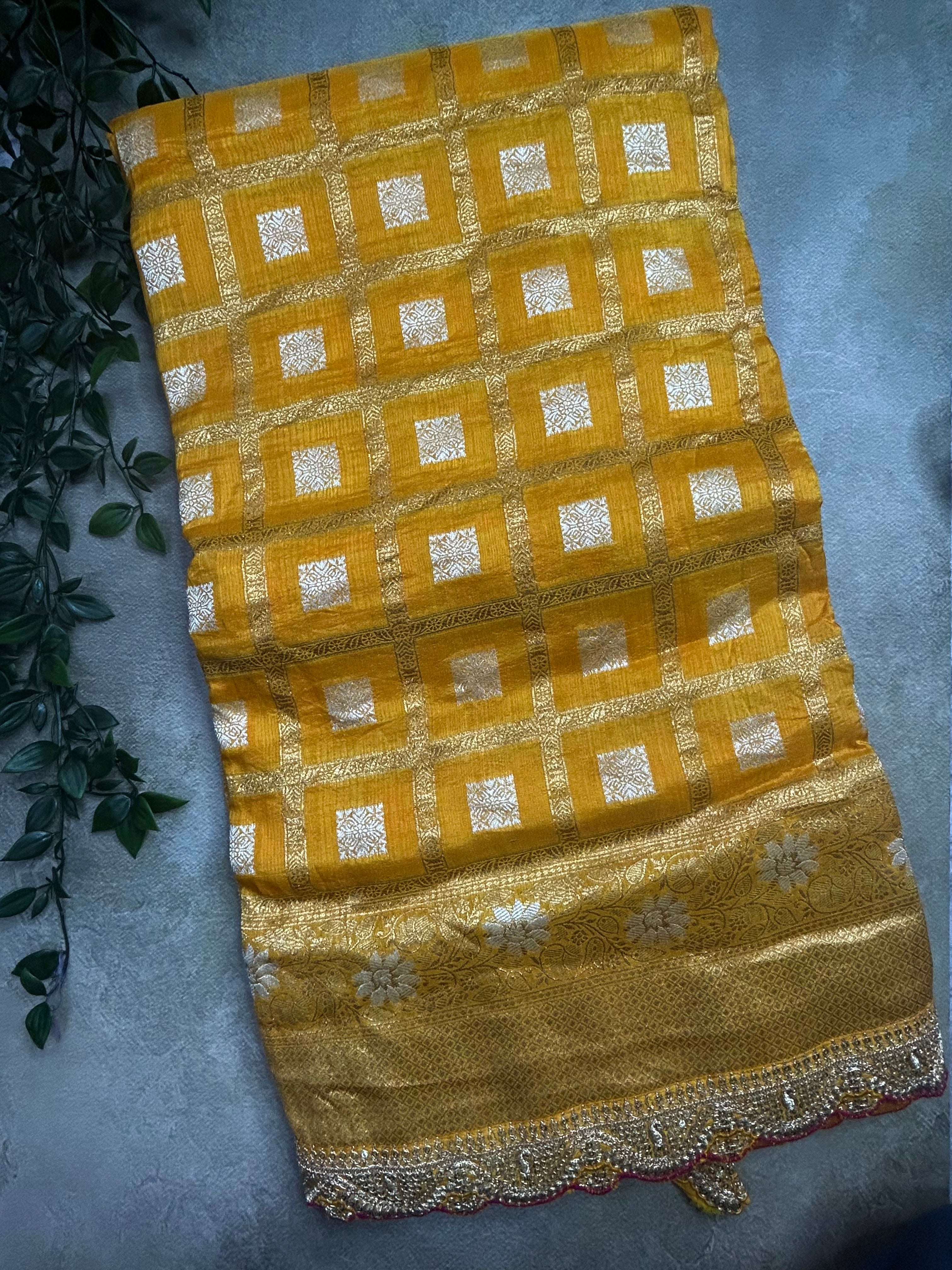 Mustard yellow checks brocade party wear scallop border saree