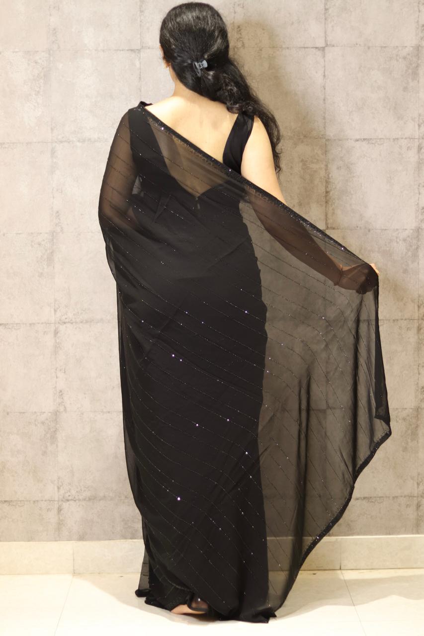 Black stone work party wear Georgette saree
