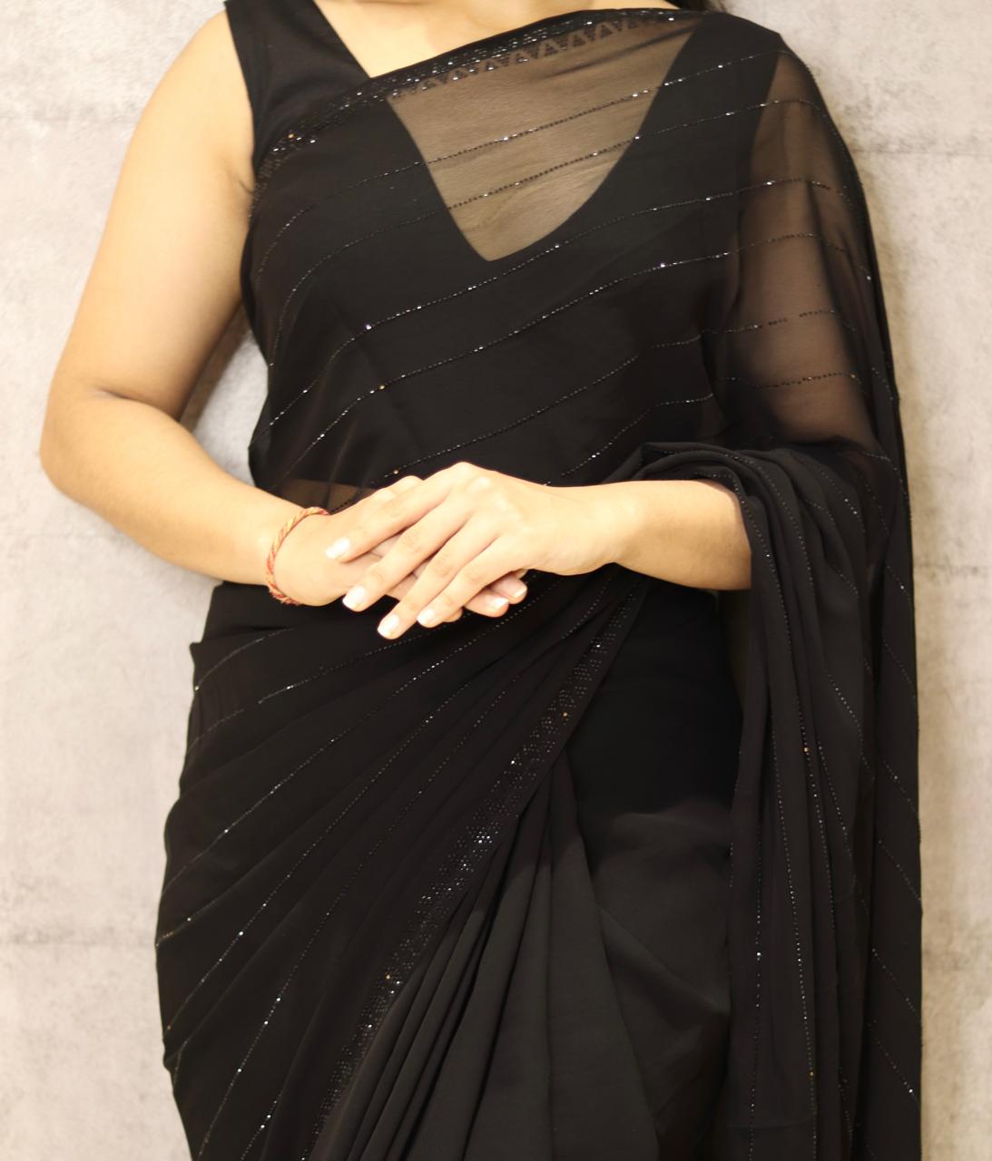 Black stone work party wear Georgette saree