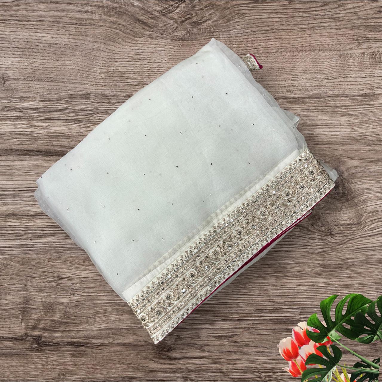 Cream sabyasachi inspired pure organza saree with contrast blouse