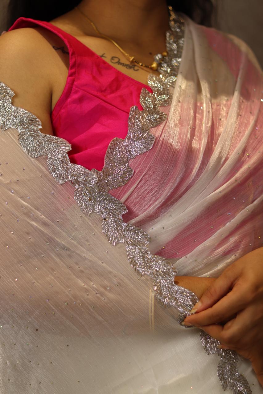 White chinnon crepe party wear with heavy border