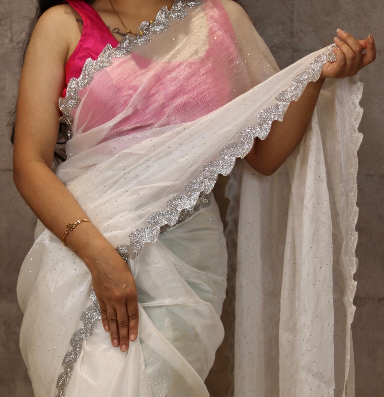 White chinnon crepe party wear with heavy border