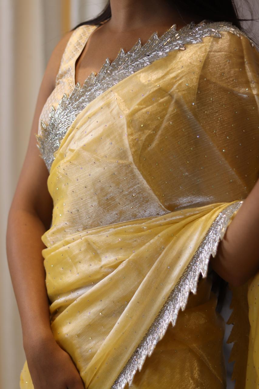 Yellow chinnon crepe party wear with heavy border