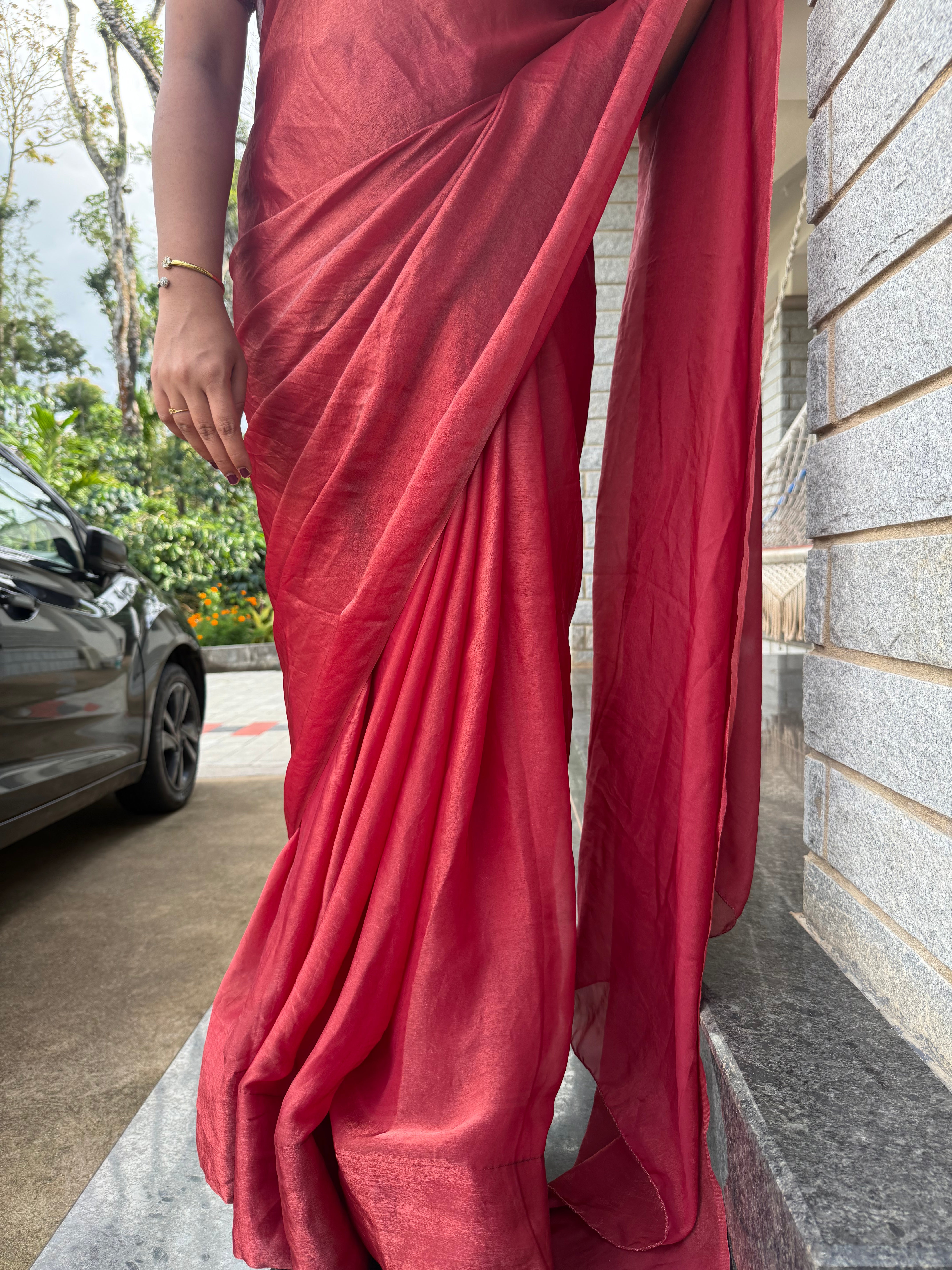 Arpitha red party wear with heavy work blouse saree