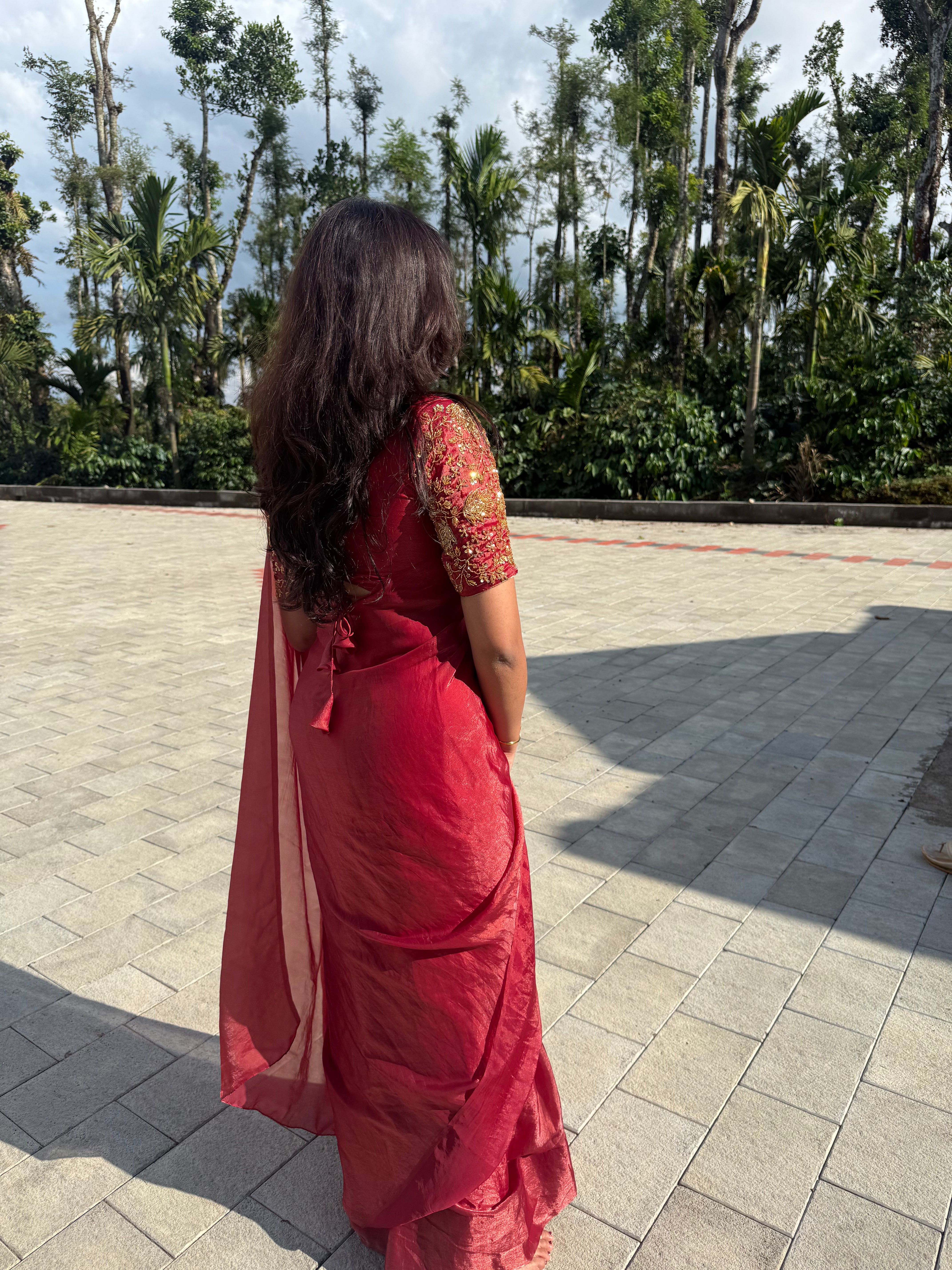 Arpitha red party wear with heavy work blouse saree