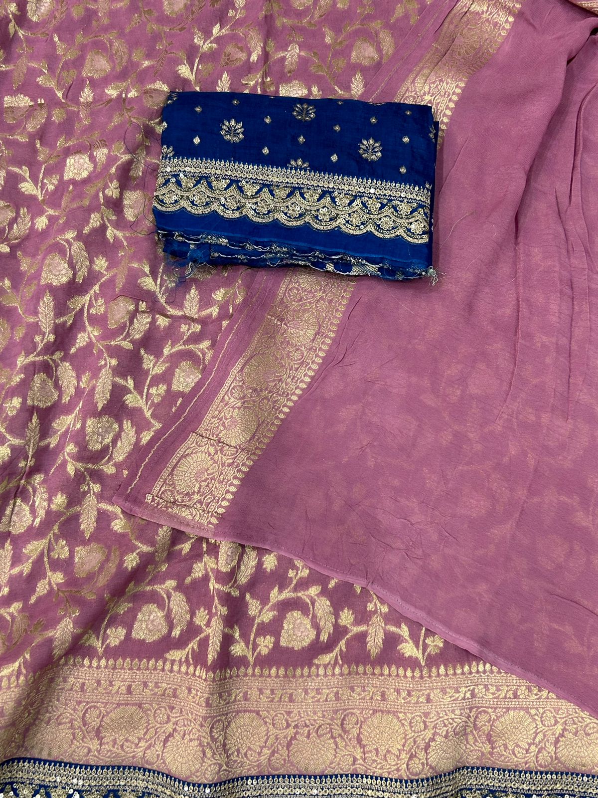 Light magenta n blue scallop border benaras georgette saree