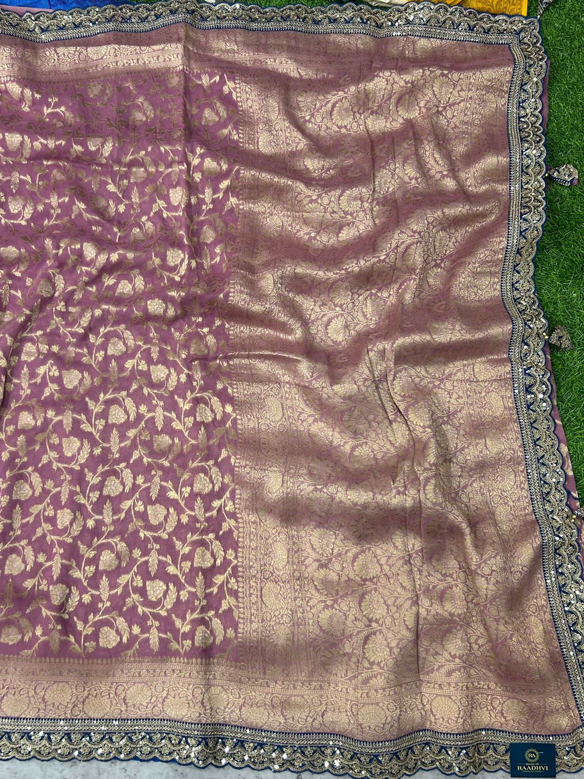 Light magenta n blue scallop border benaras georgette saree
