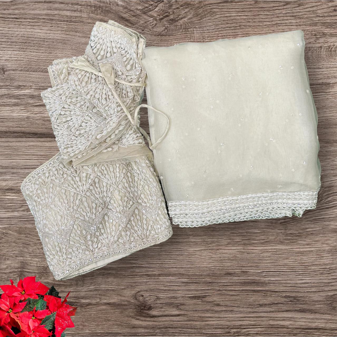 White stitched blouse designer party wear organza saree