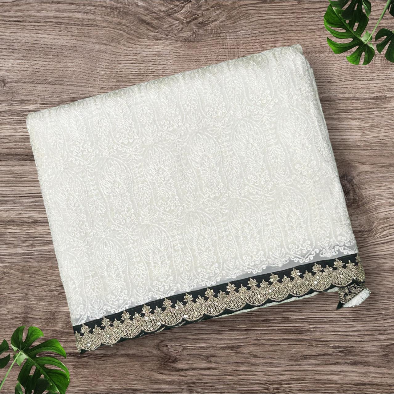 White with black chikankari scallop pure georgette saree