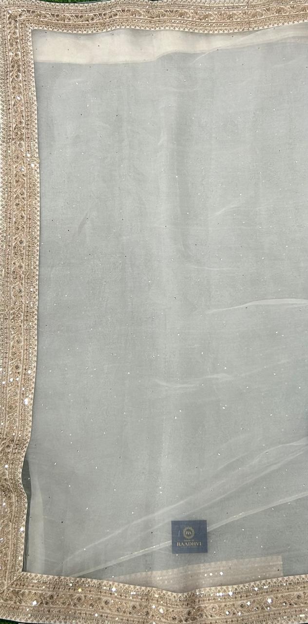 White sabyasachi inspired pure organza saree with contrast blouse