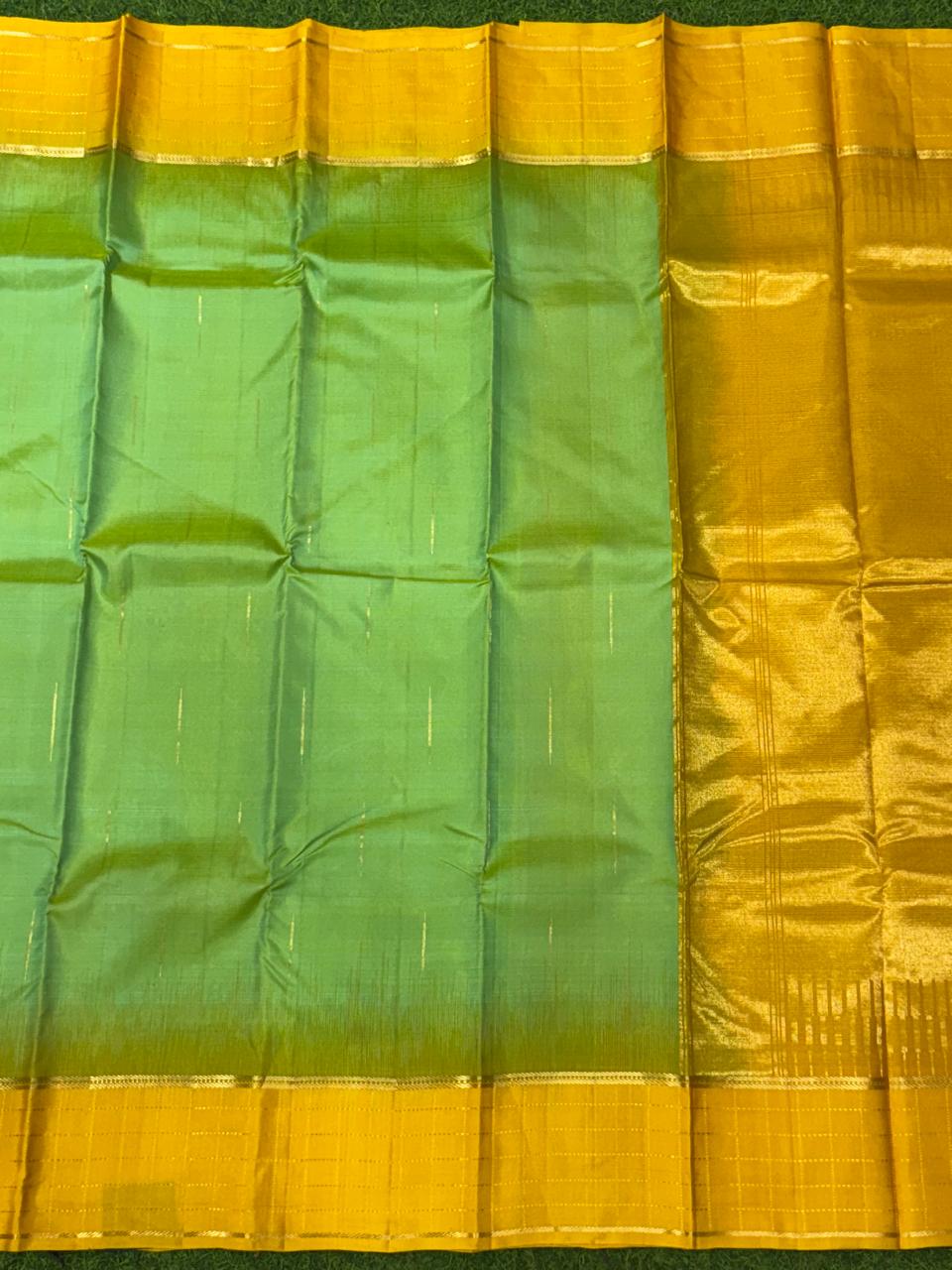 Parrot green and peach pure Kanchipuram silk saree