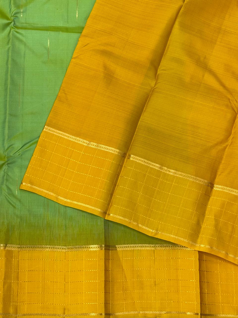 Parrot green and peach pure Kanchipuram silk saree