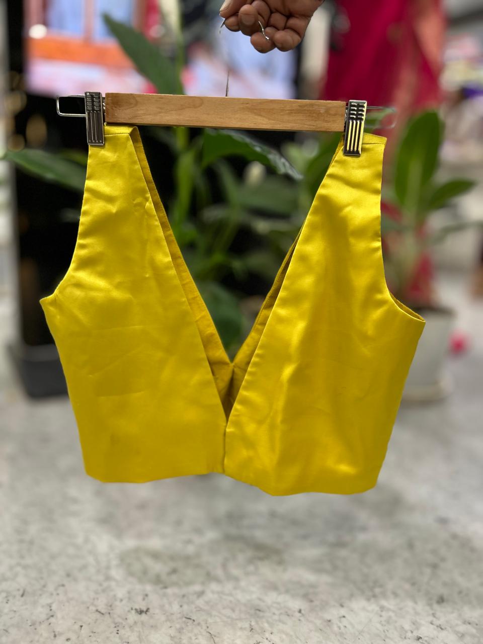 Yellow satin plain sleeveless blouse