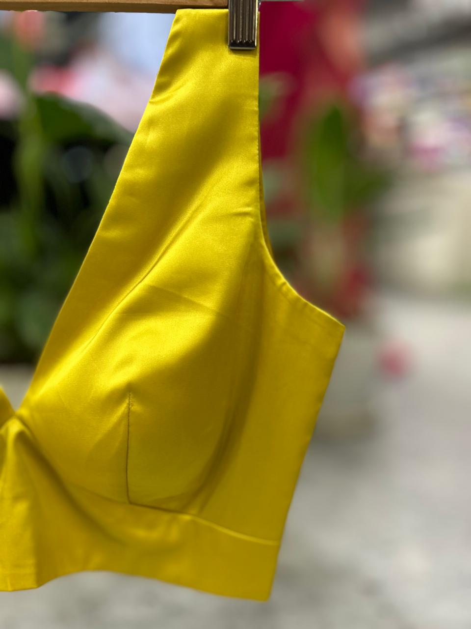 Yellow satin plain sleeveless blouse