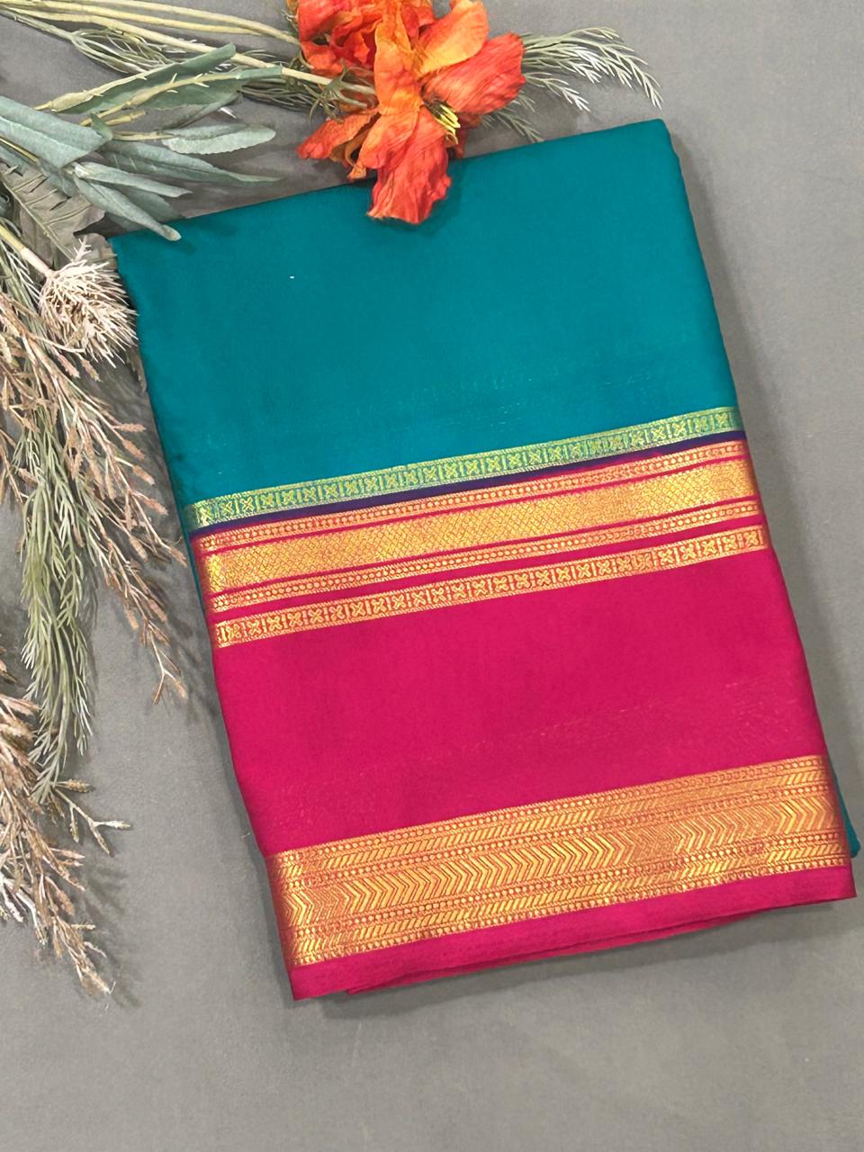 Peacock blue n pink bentex border semi crepe silk saree