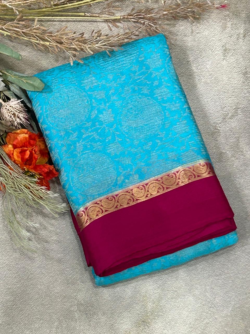 Sky blue n magenta brocade pure wrinkle crepe silk saree