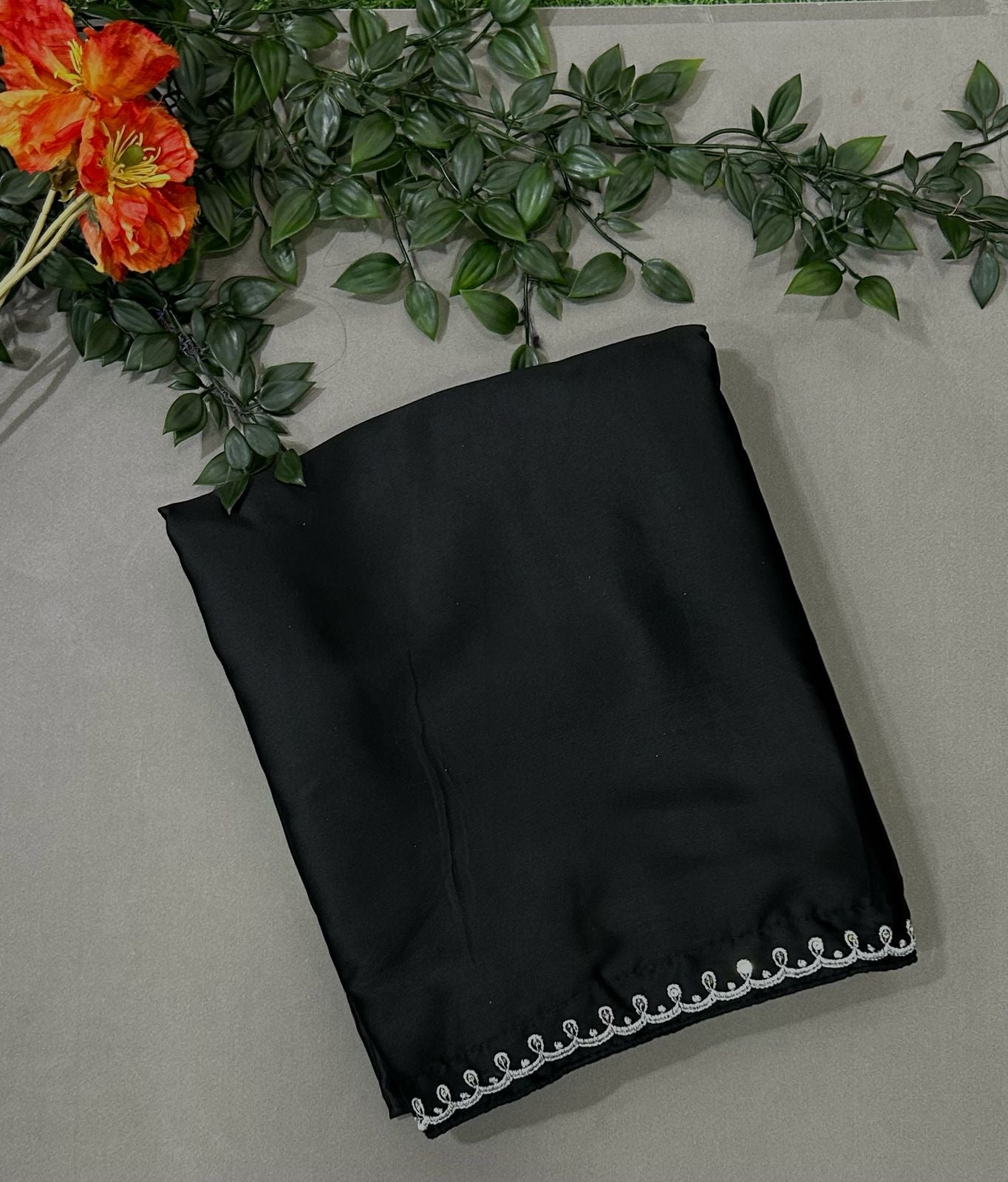 Shriya Saran inspired black satin saree- stitched blouse