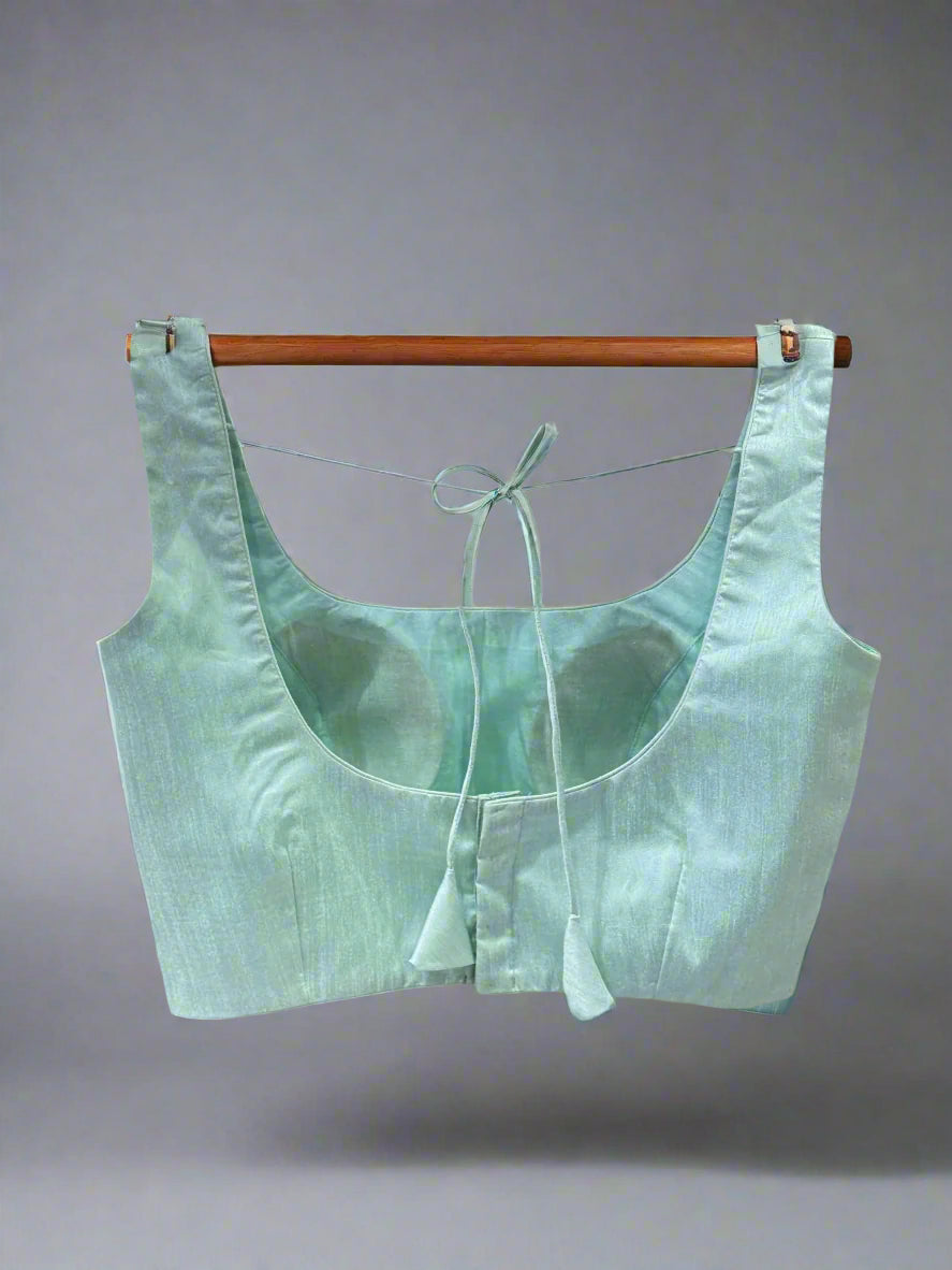 sea green semi raw silk  sleeveless blouse