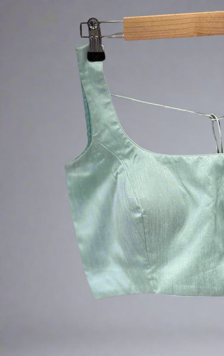 sea green semi raw silk  sleeveless blouse