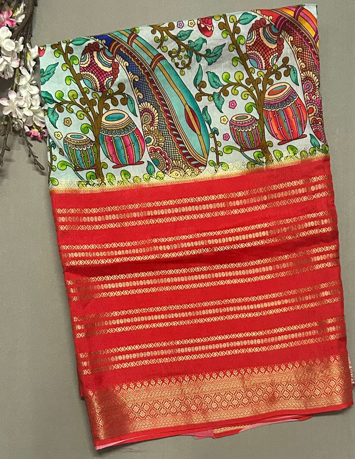 Multi colour kalamkari printed dola crepe saree