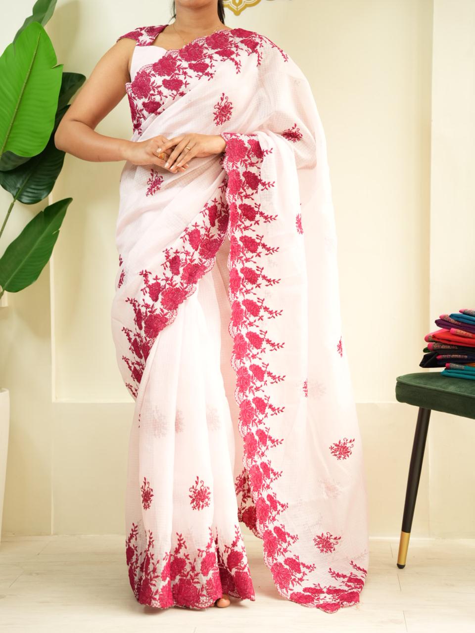 Pastel pink kota checks embrodiery thread work saree