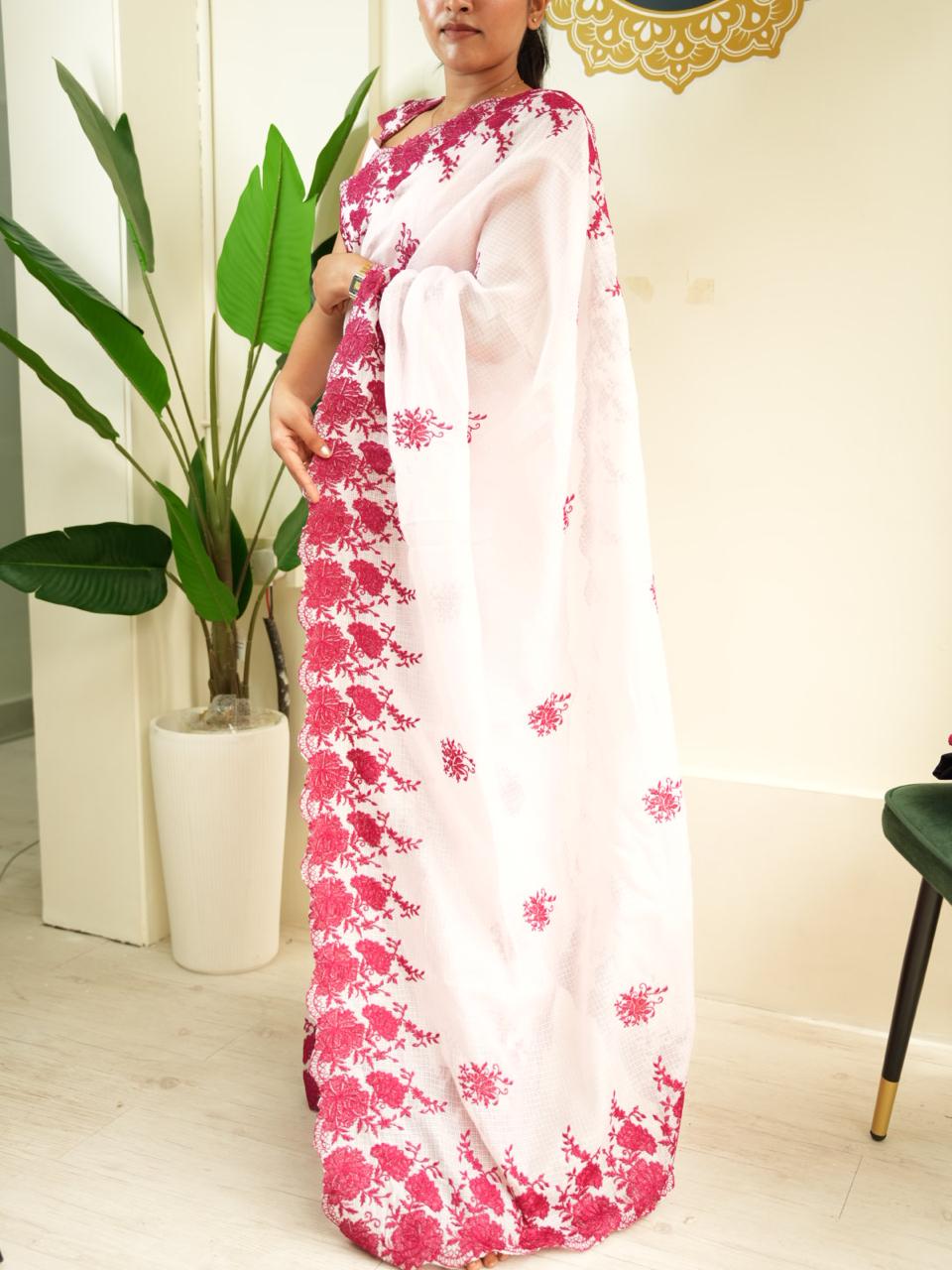 Pastel pink kota checks embrodiery thread work saree