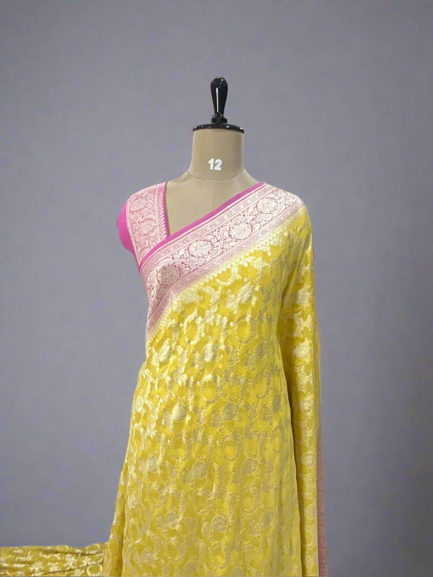 Yellow n pink jaal premium pure georgette saree