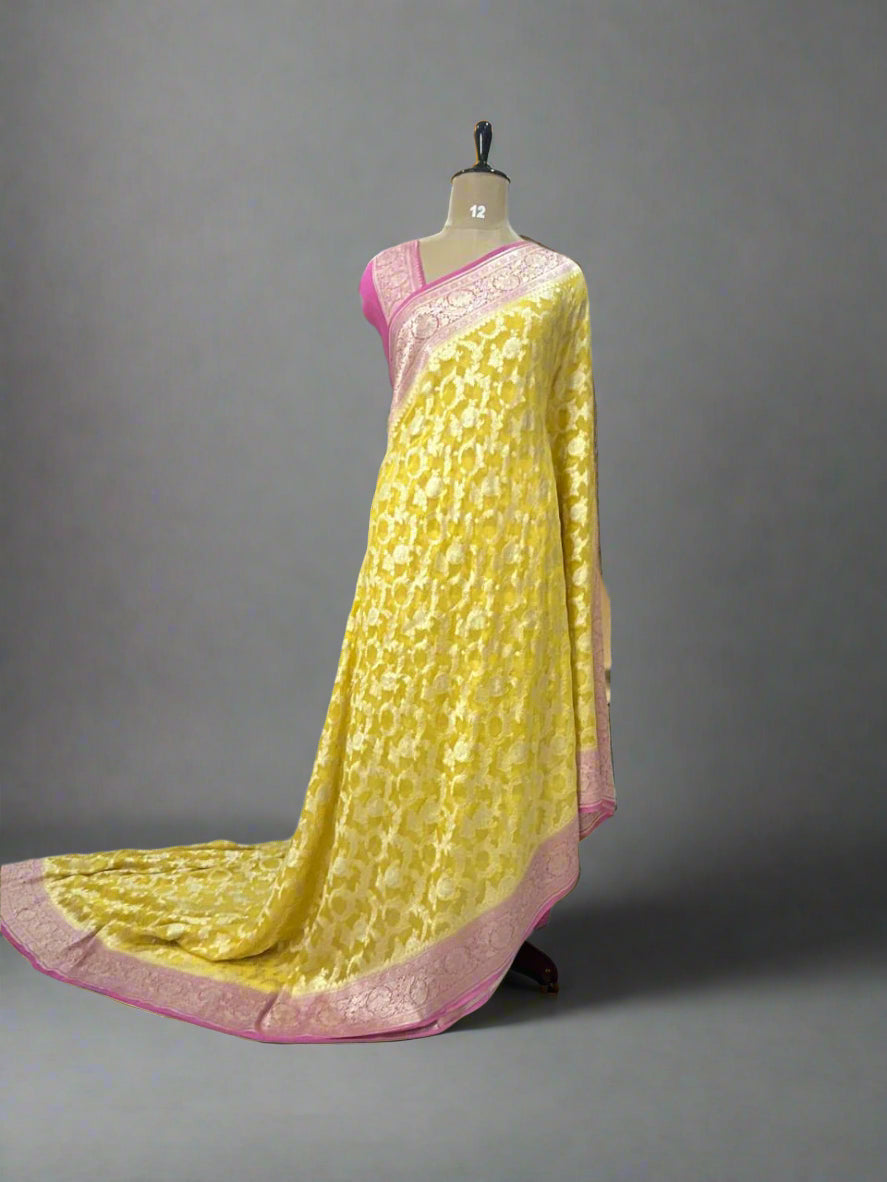 Yellow n pink jaal premium pure georgette saree