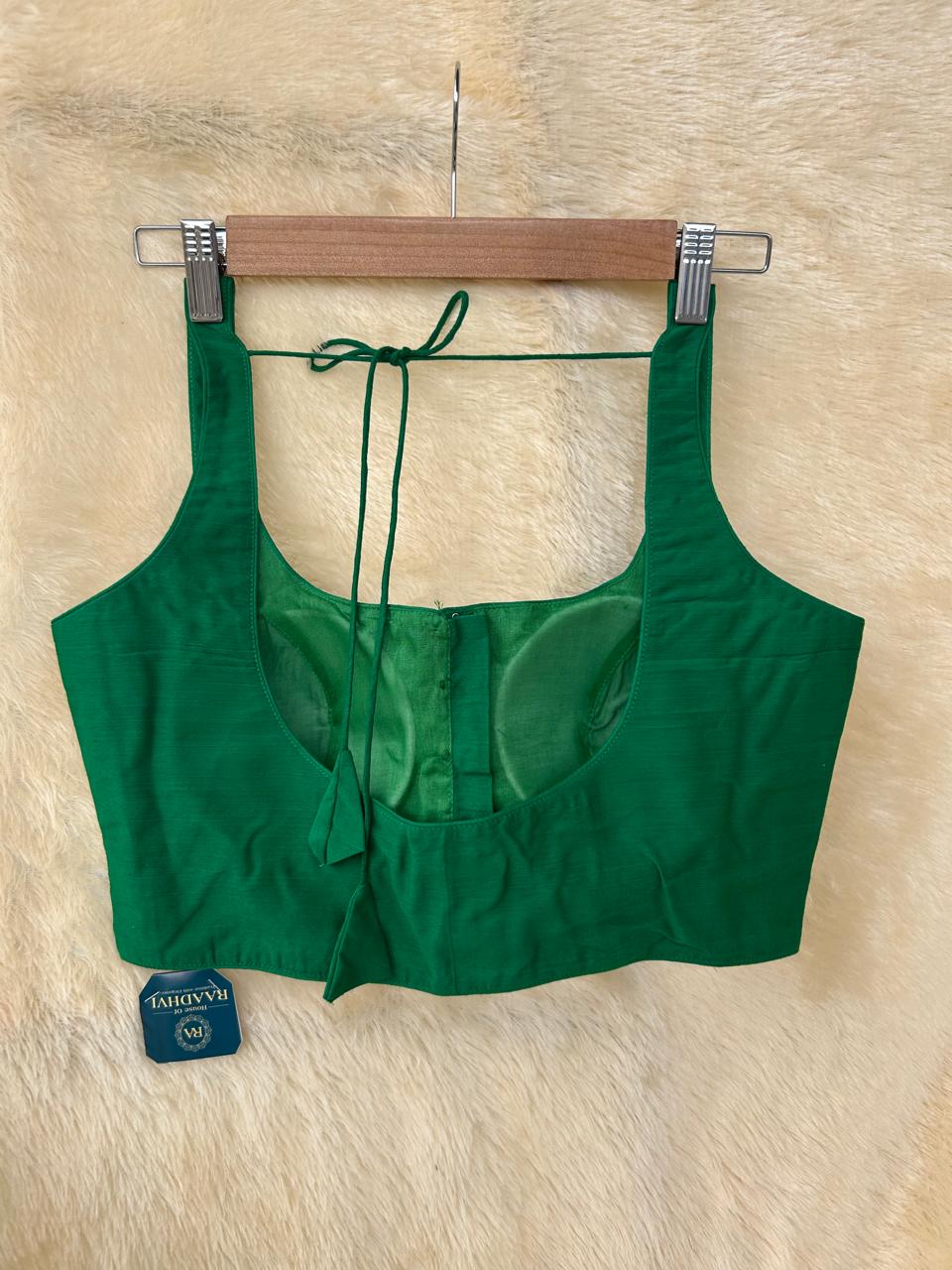 Green raw silk sleeveless blouse