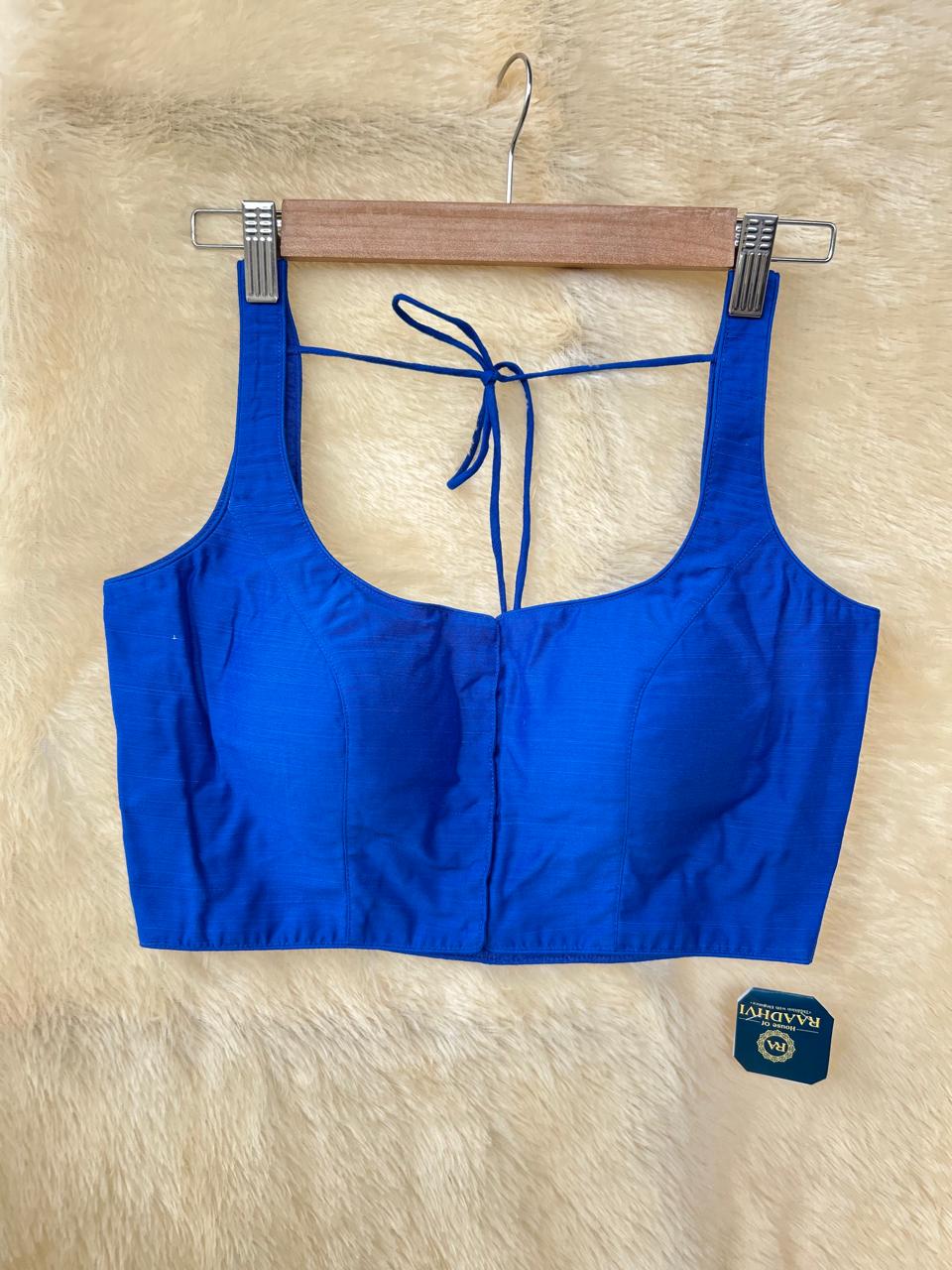 Blue raw silk sleeveless blouse