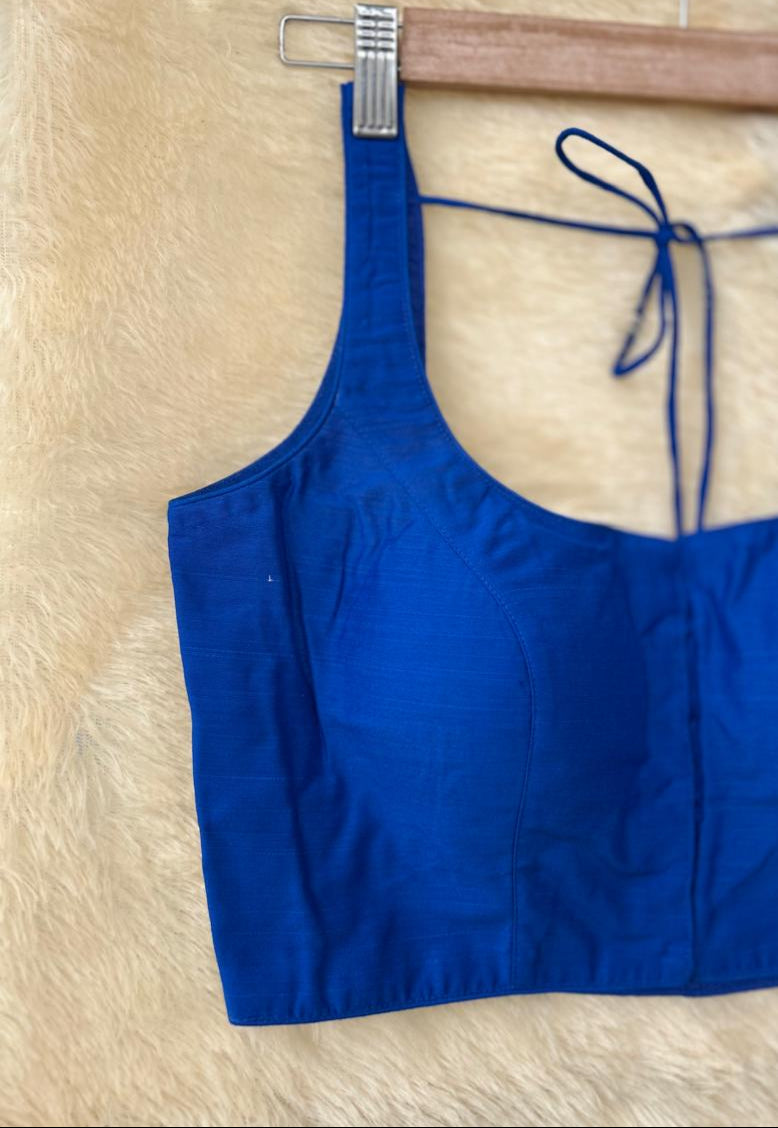 Blue raw silk sleeveless blouse