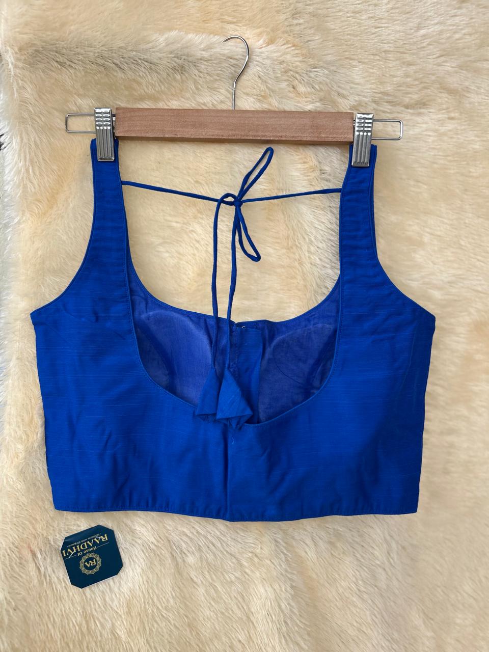 Blue raw silk sleeveless blouse