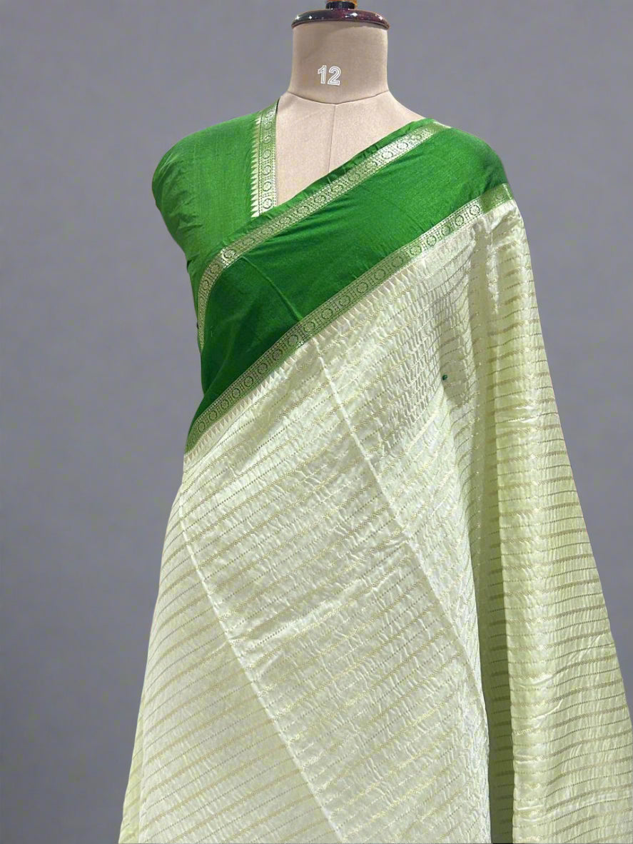 Pista green gadwal border semi chiniya silk saree