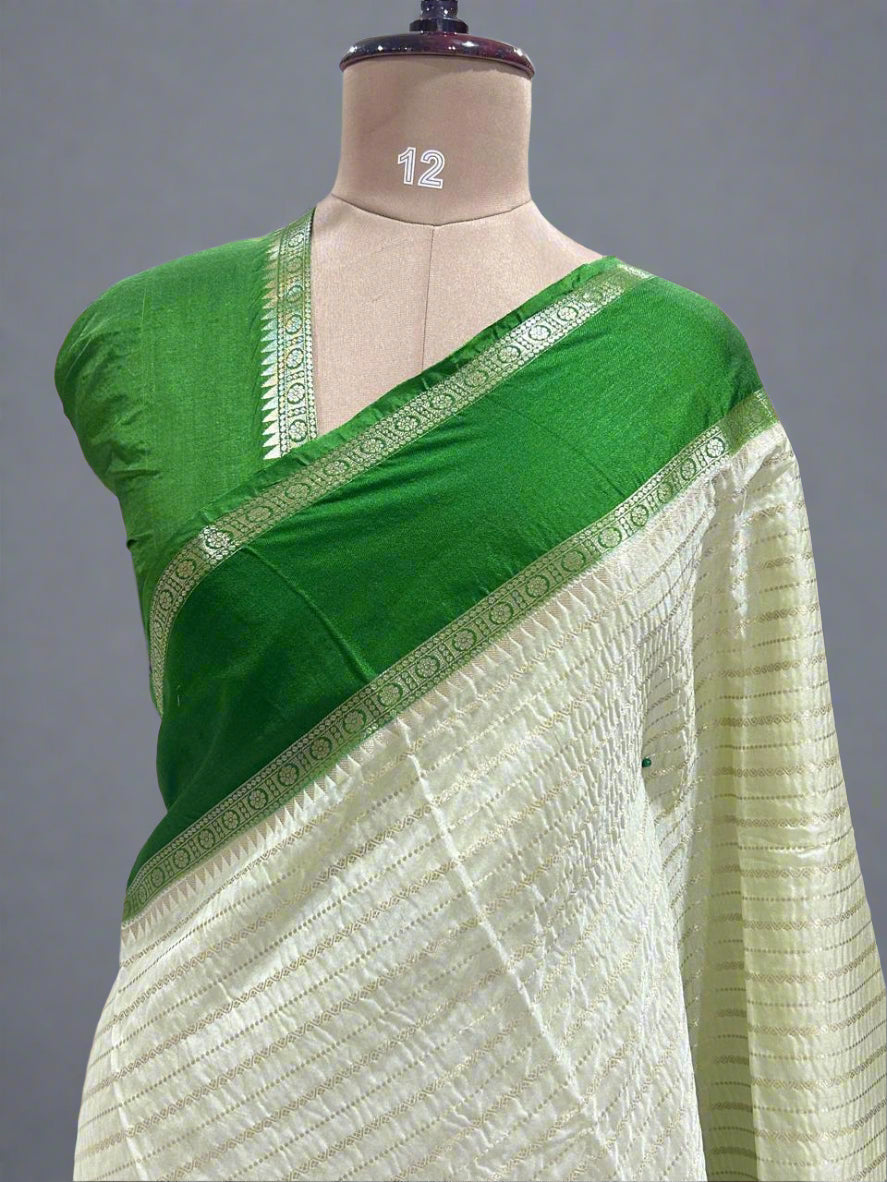 Pista green gadwal border semi chiniya silk saree