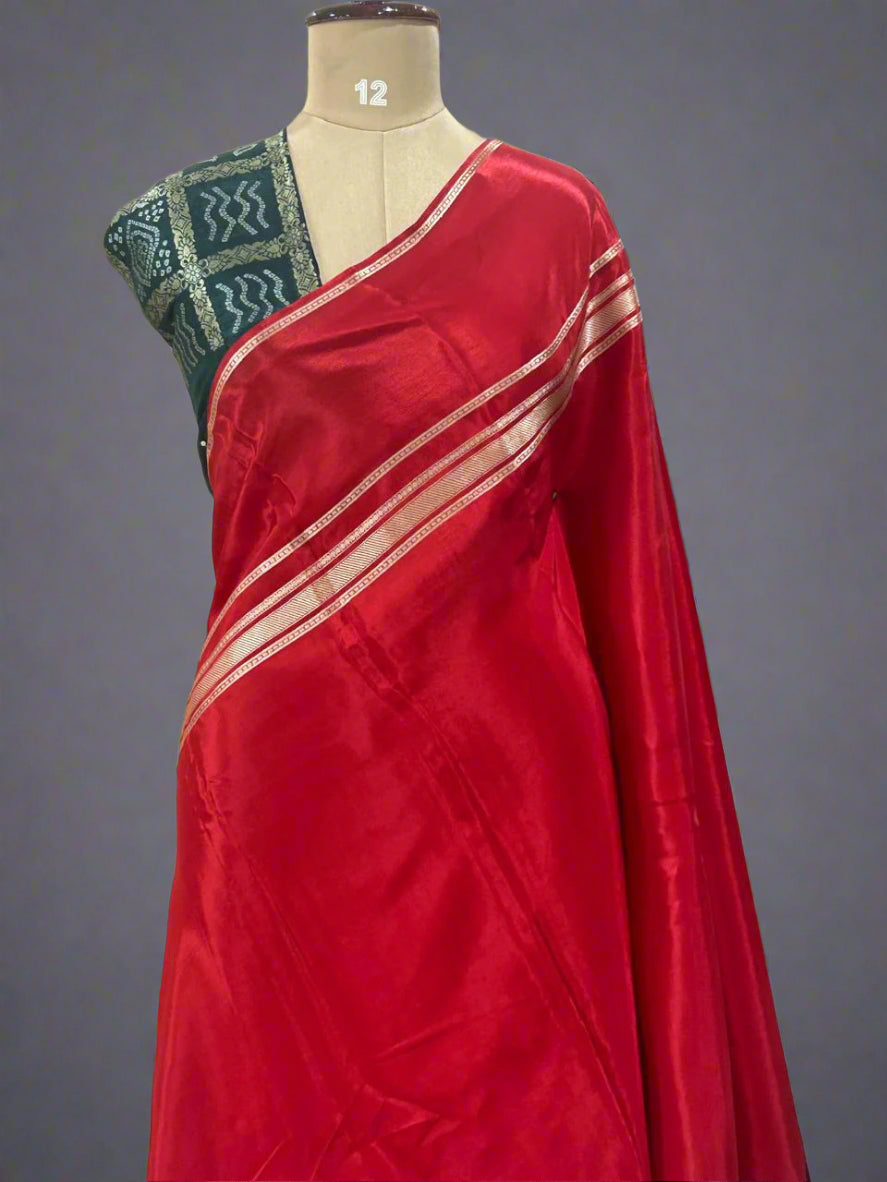 Red plain four border semi mysore crepe saree