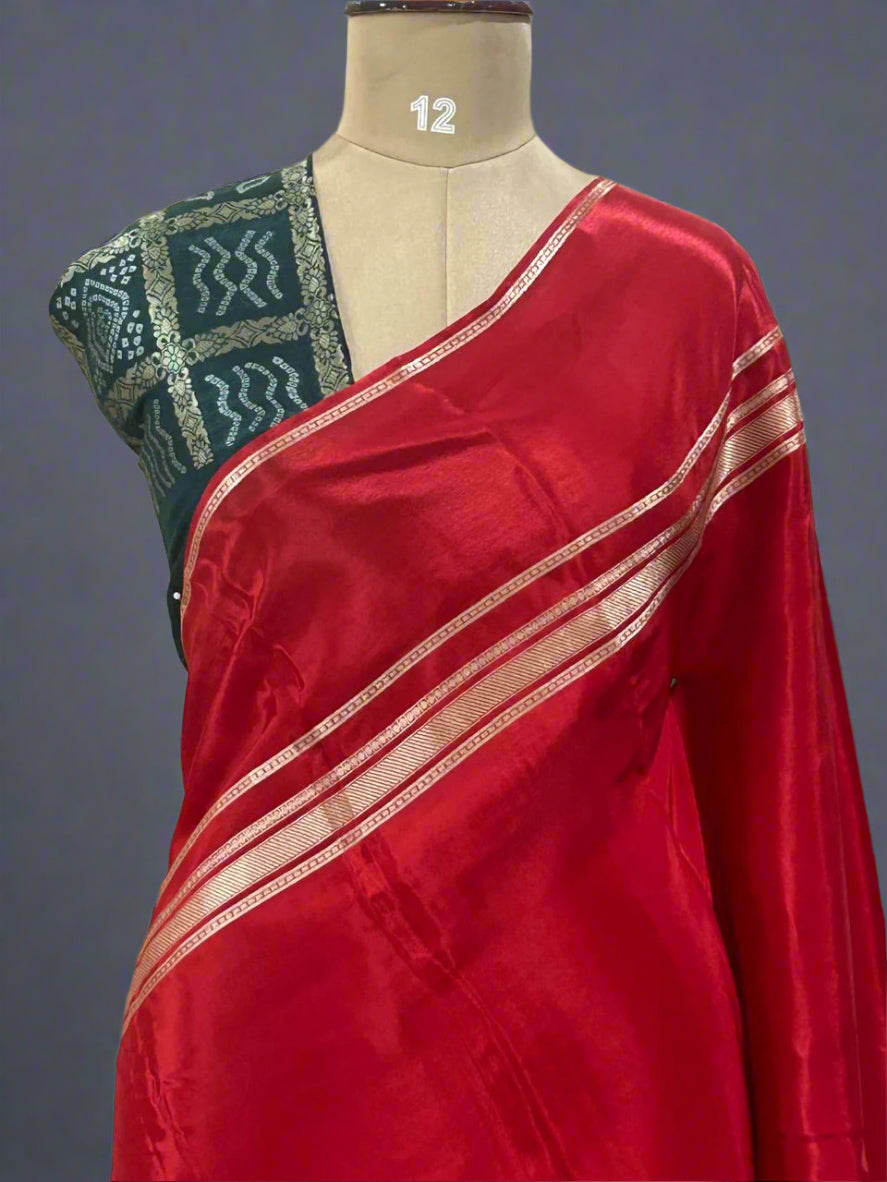 Red plain four border semi mysore crepe saree