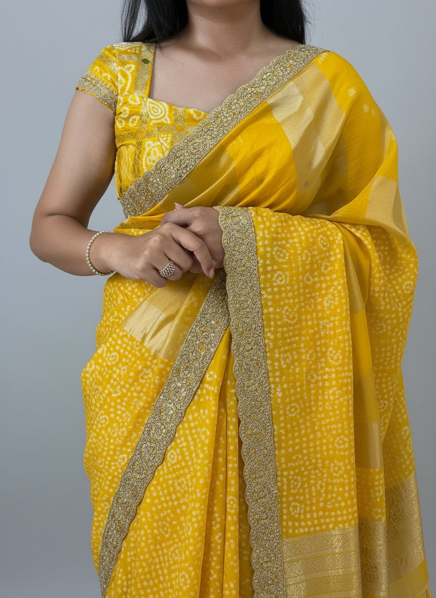 Yellow sabyasachi stripes with bandhini design blouse saree