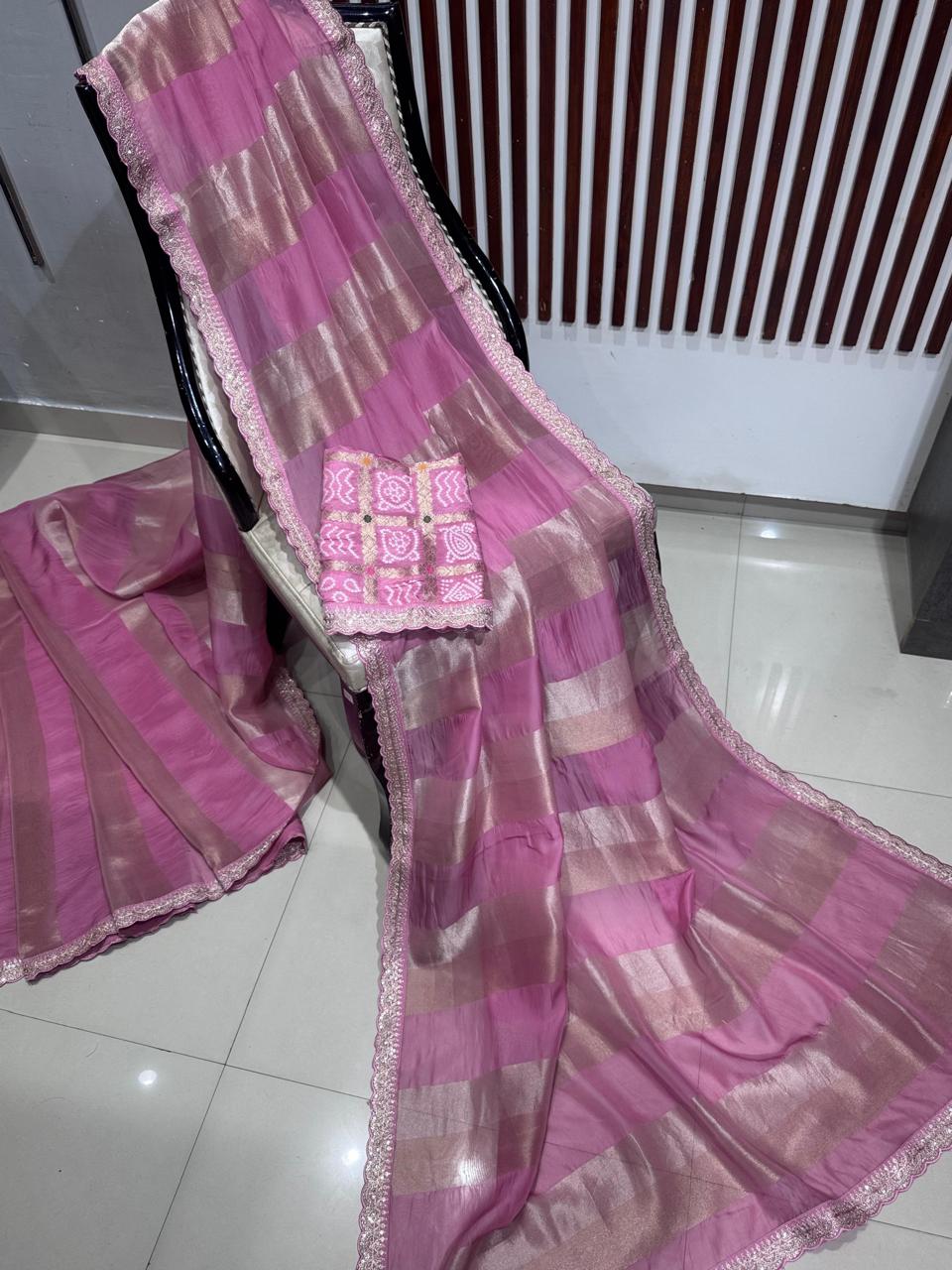 Pink sabyasachi stripes with bandhini design blouse saree