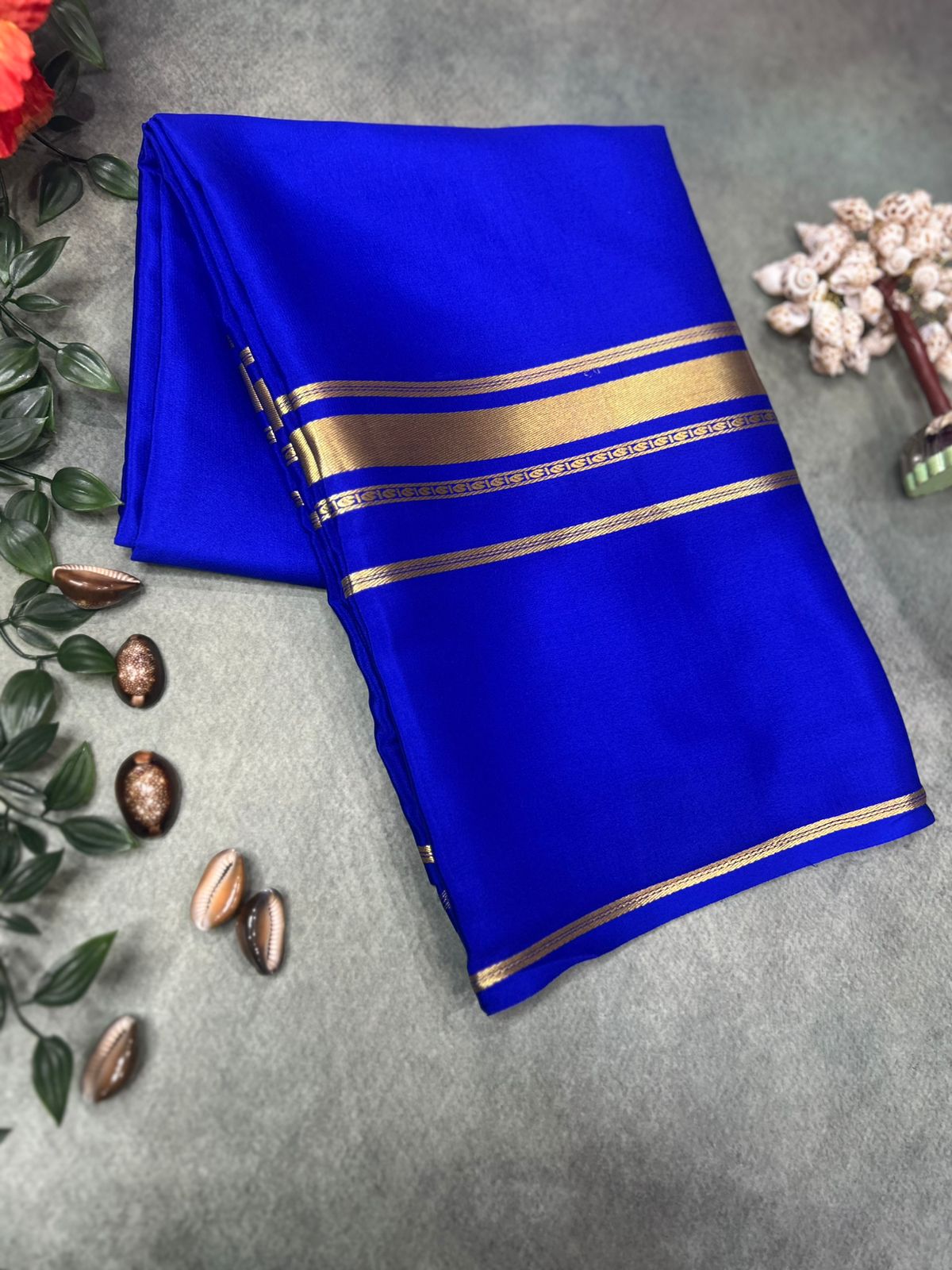 Royal blue plain four border pure mysore crepe silk saree