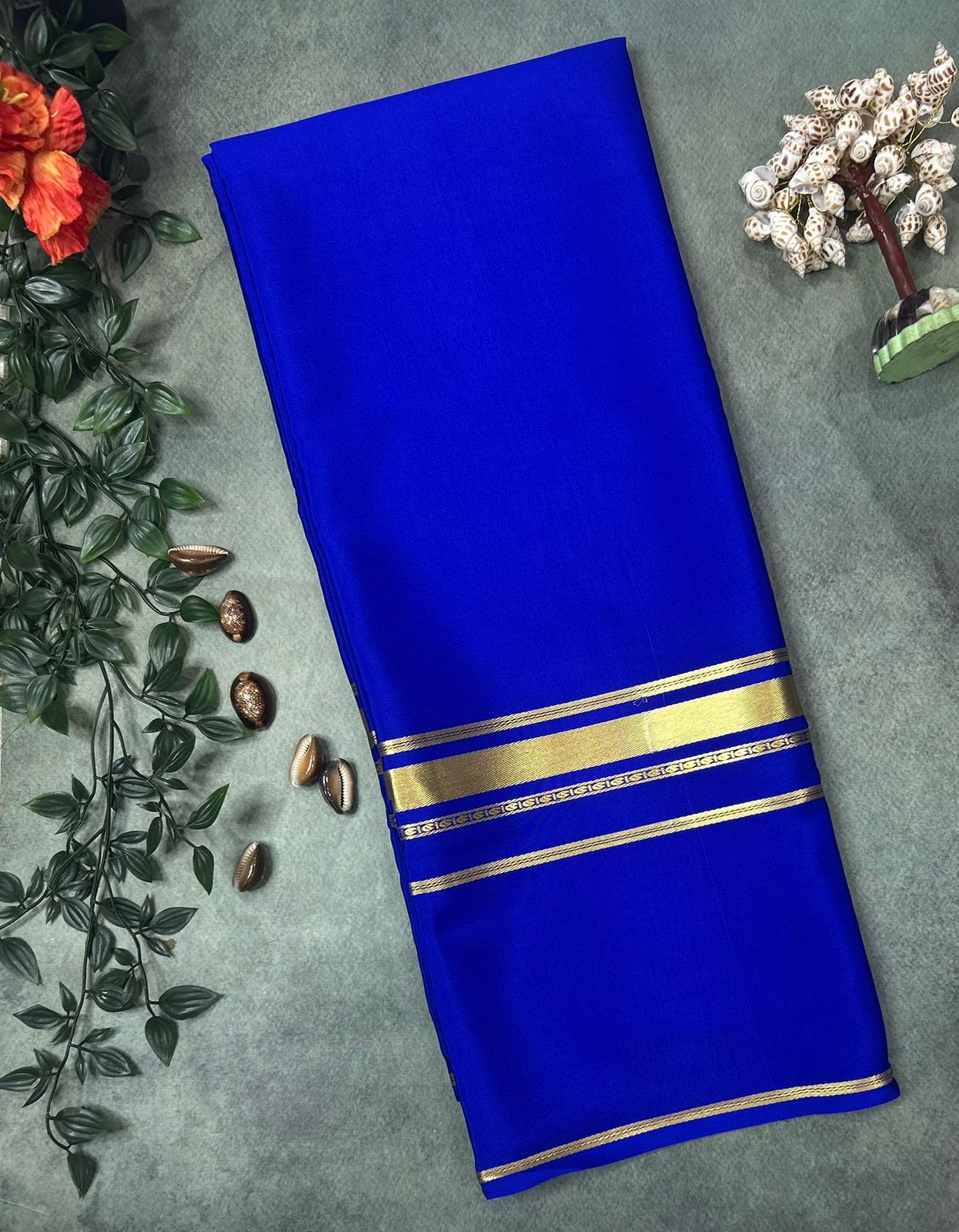Royal blue plain four border pure mysore crepe silk saree
