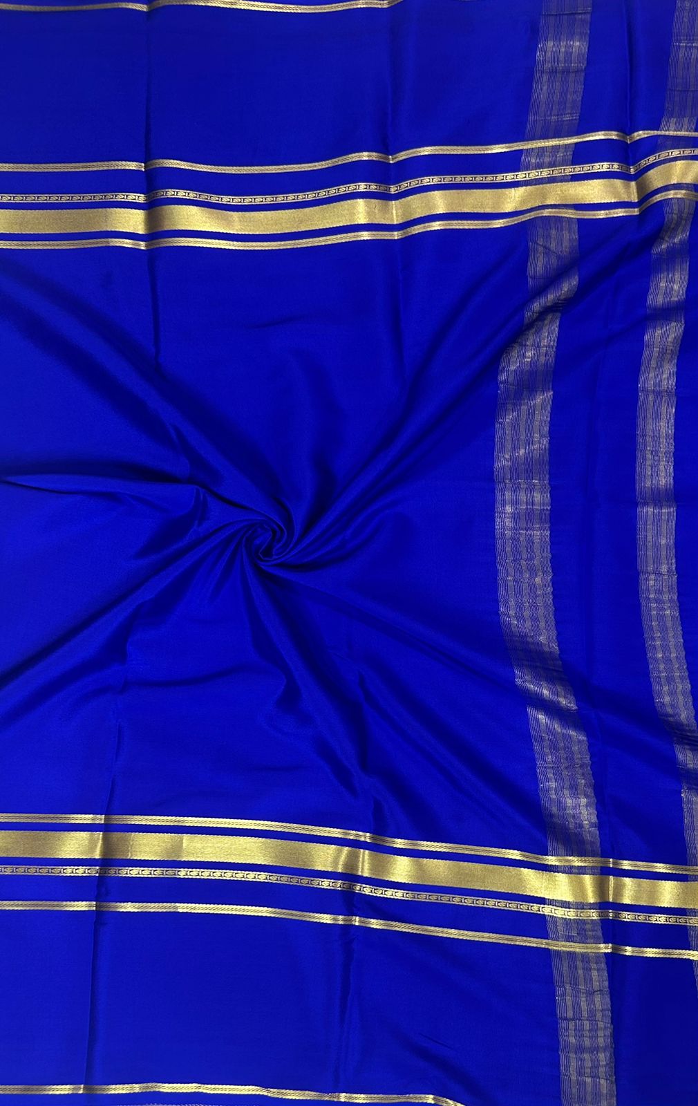 Royal blue plain four border pure mysore crepe silk saree