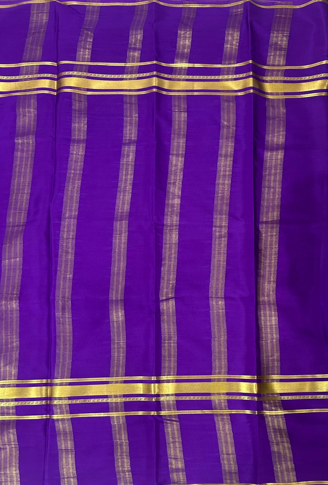 Light purple plain four border pure mysore crepe silk saree