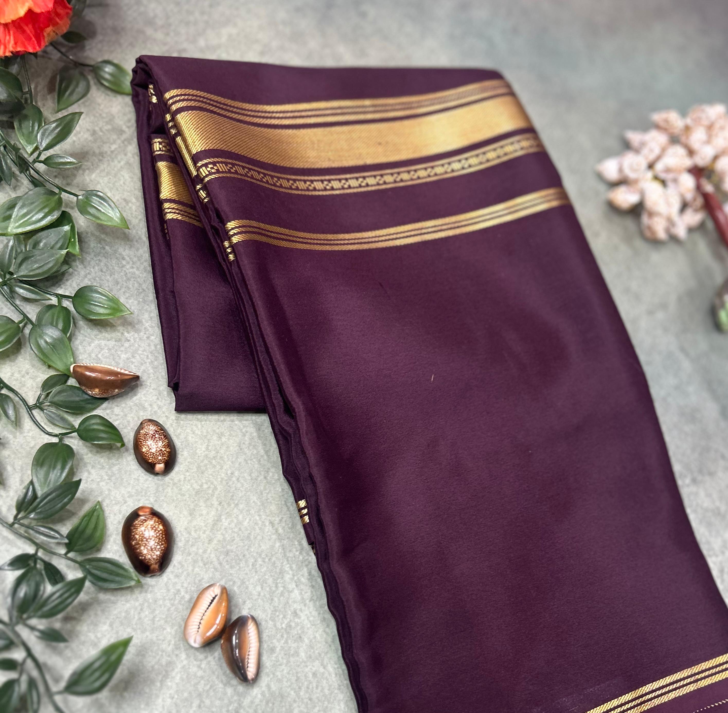 Dark brown  plain four border pure mysore crepe silk saree