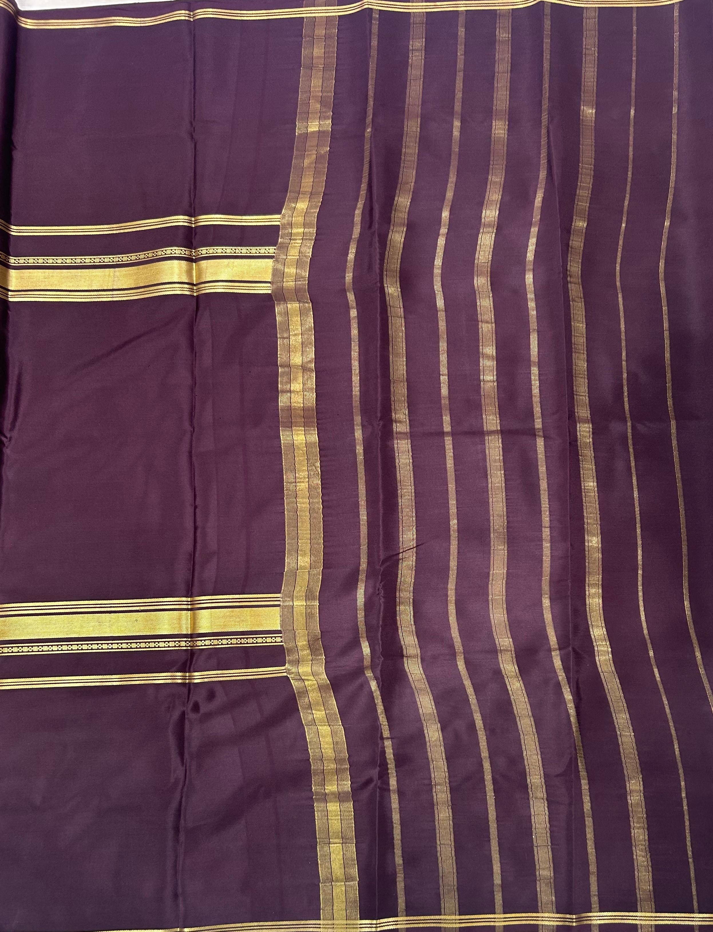 Dark brown  plain four border pure mysore crepe silk saree