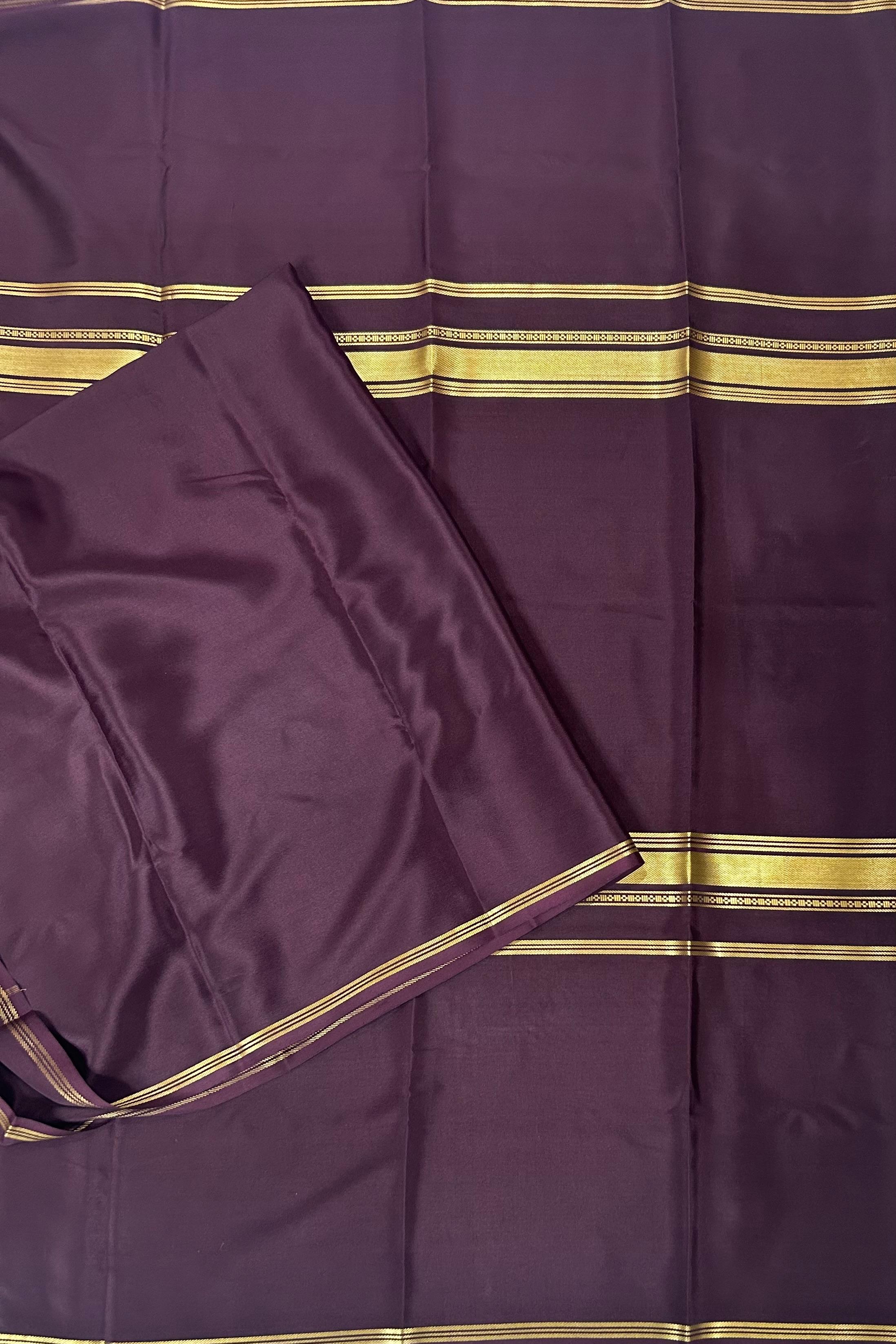 Dark brown  plain four border pure mysore crepe silk saree
