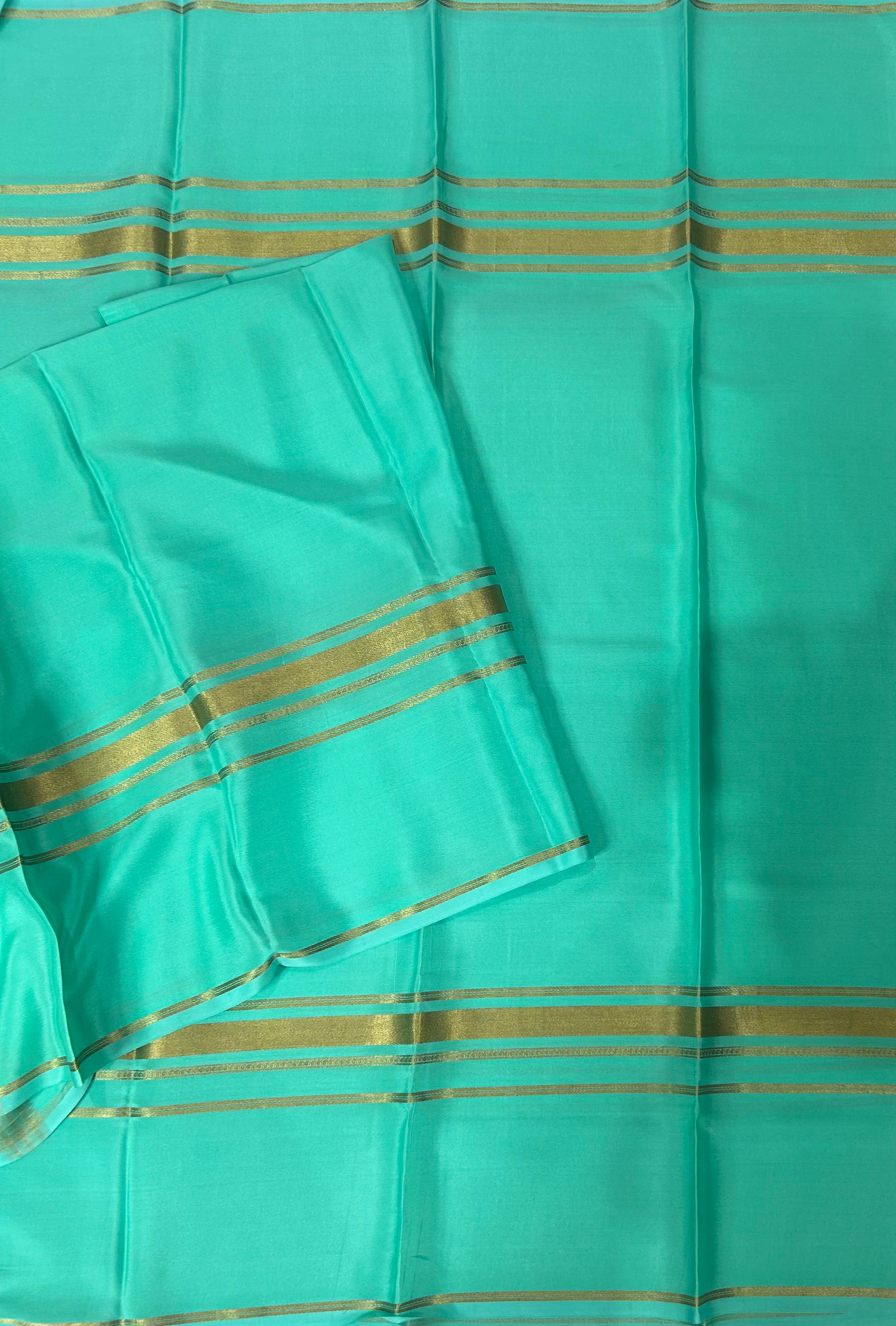 Distemper plain four border pure mysore crepe silk saree