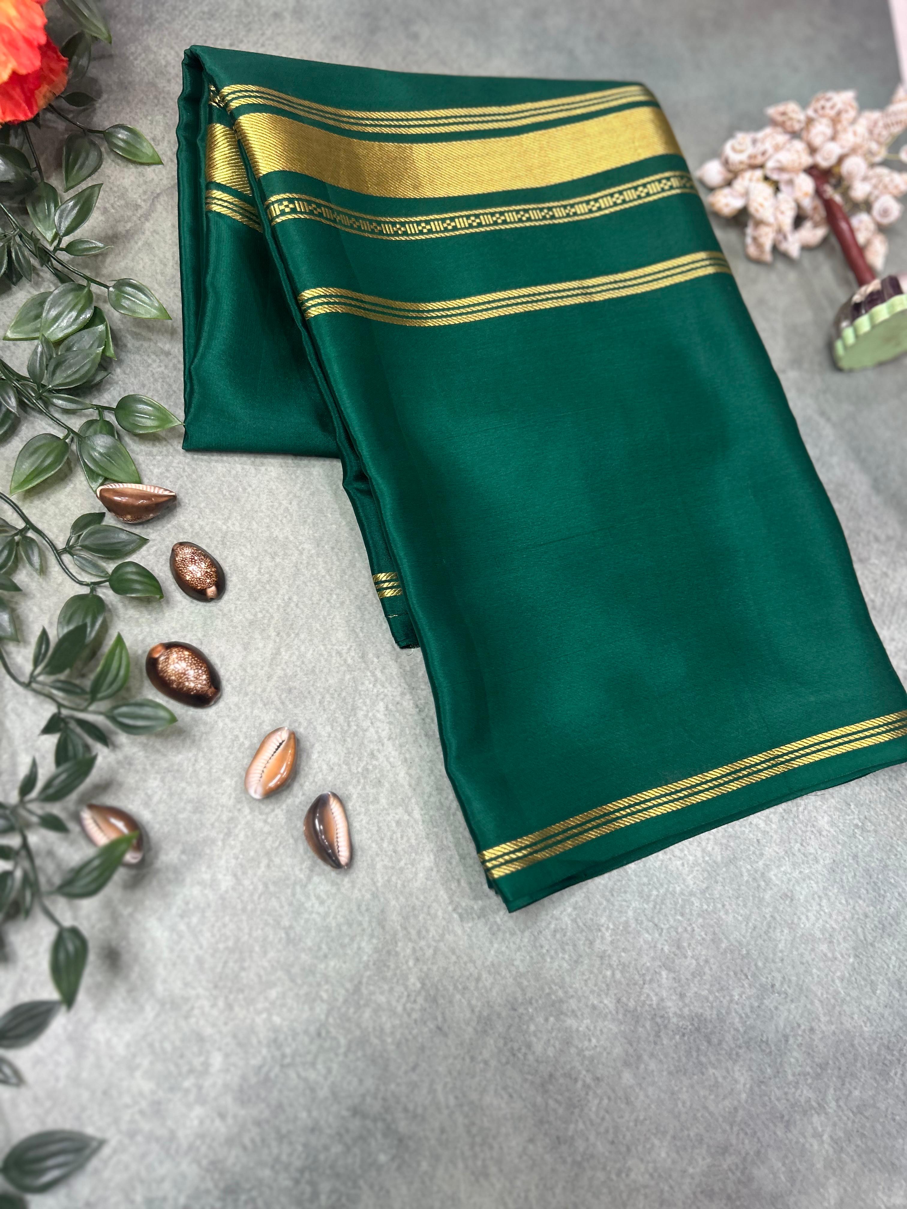 Bottle green plain four border pure mysore crepe silk saree