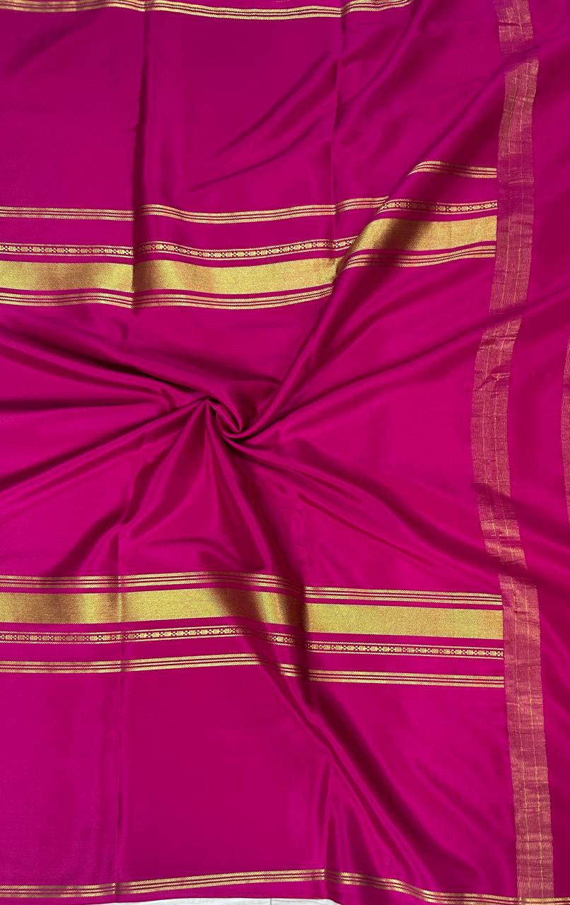 Rani pink plain four border pure mysore crepe silk saree