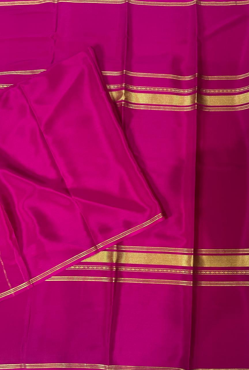 Rani pink plain four border pure mysore crepe silk saree